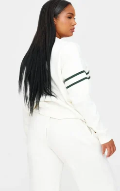 PRETTYLITTLETHING Plus Cream Contrast Print Oversized Sweatshirt