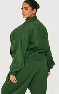 PrettyLittleThing Plus Forest Green Borg Applique Quarter Zip Sweatshirt