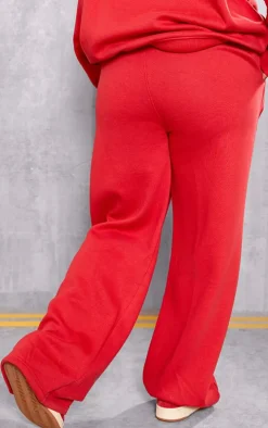 PRETTYLITTLETHING Plus Red Embossed Graphic Straight Leg Sweatpants