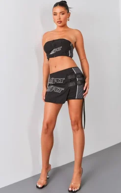 PRETTYLITTLETHING Premium Black Motocross Wrap Buckle Front Micro Mini Skirt