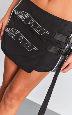 PRETTYLITTLETHING Premium Black Motocross Wrap Buckle Front Micro Mini Skirt