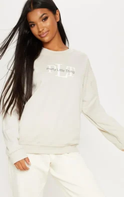 PRETTYLITTLETHING Sand Graphic Oversized Fit Sweatshirt