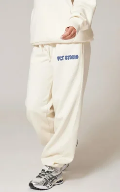 PRETTYLITTLETHING Sand Premium Studio Print Cuffed Sweatpants