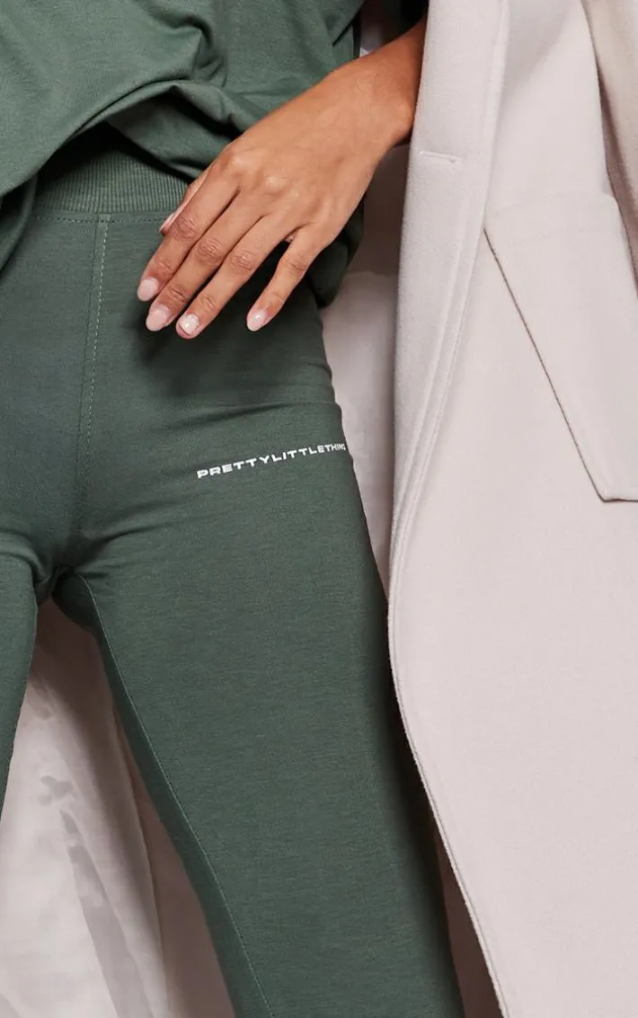 PRETTYLITTLETHING Sea Green Print Flared Pants