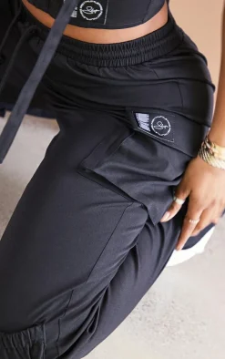 PRETTYLITTLETHING Shape Black Cargo Pocket Detail Wide Leg Sweatpants