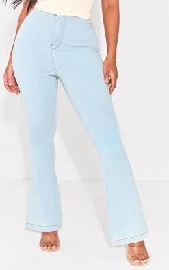 PRETTYLITTLETHING Shape Light Blue Wash Split Hem Detail Flared Jeans