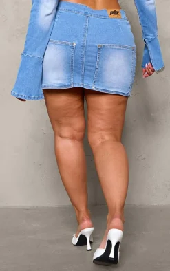 PRETTYLITTLETHING Shape Light Blue Badge Denim Mini Skirt