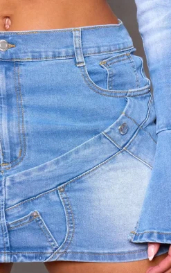 PRETTYLITTLETHING Shape Light Blue Badge Denim Mini Skirt