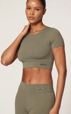 PRETTYLITTLETHING Sport Olive Metal Badge Sculpt Short Sleeve Top