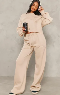 PRETTYLITTLETHING Tall Stone Distressed Varsity Cropped Sweatshirt