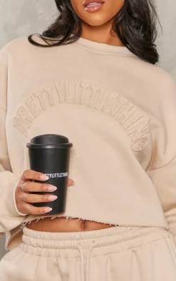 PRETTYLITTLETHING Tall Stone Distressed Varsity Cropped Sweatshirt