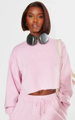 PRETTYLITTLETHING Tall Washed Pink Distressed Varsity Cropped Sweatshirt