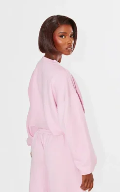 PRETTYLITTLETHING Tall Washed Pink Distressed Varsity Cropped Sweatshirt