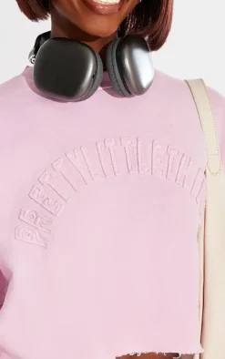 PRETTYLITTLETHING Tall Washed Pink Distressed Varsity Cropped Sweatshirt