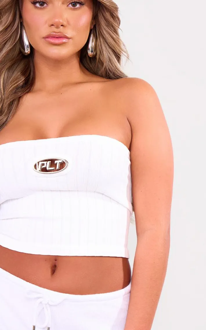 PRETTYLITTLETHING White Metal Badge Snatched Rib Bandeau Top