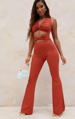 Rust Rib Twist Detail Plunge Flared Jumpsuit