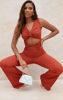 Rust Rib Twist Detail Plunge Flared Jumpsuit