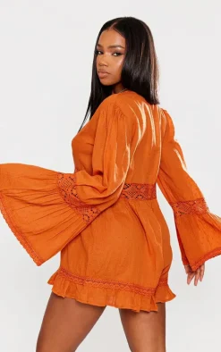 Rust Sheer Dobby Textured V Front Flowy Romper