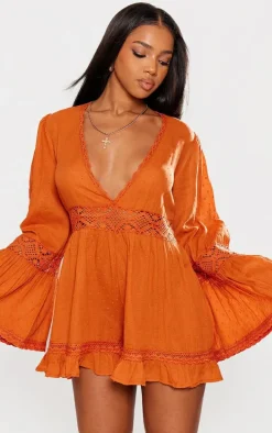 Rust Sheer Dobby Textured V Front Flowy Romper