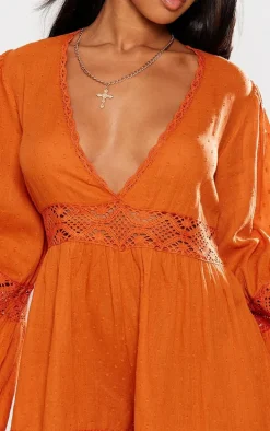 Rust Sheer Dobby Textured V Front Flowy Romper