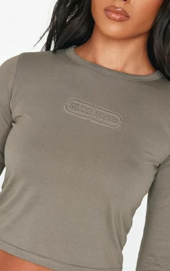 Sage Khaki Embossed Studio Archives Long Sleeve Baby T Shirt