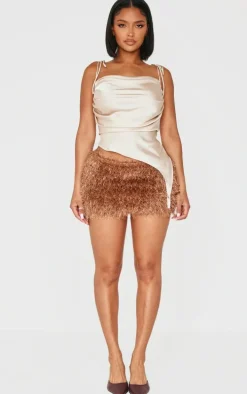 Shape Chocolate Low Rise Faux Leather Tassle Mini Skirt