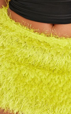 Shape Lime Low Rise Faux Leather Tassle Mini Skirt