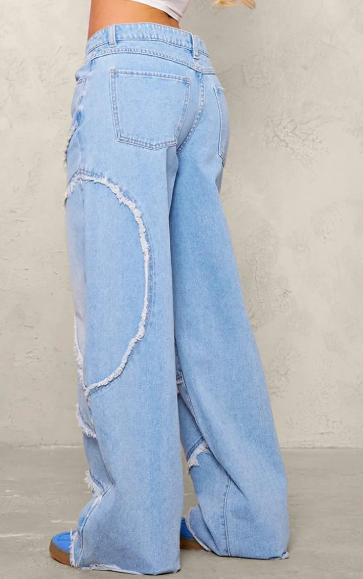 Vintage Light Wash Asymmetric Frayed Detail Mid Rise Straight Leg Jeans