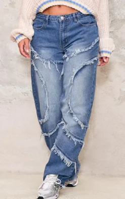 Vintage Mid Wash Asymmetric Frayed Detail Mid Rise Straight Leg Jeans