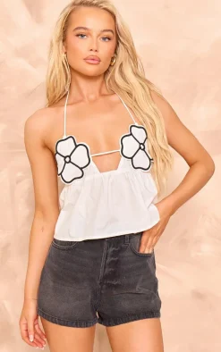 White Contrast Flower Bust Strappy Peplum Crop Top